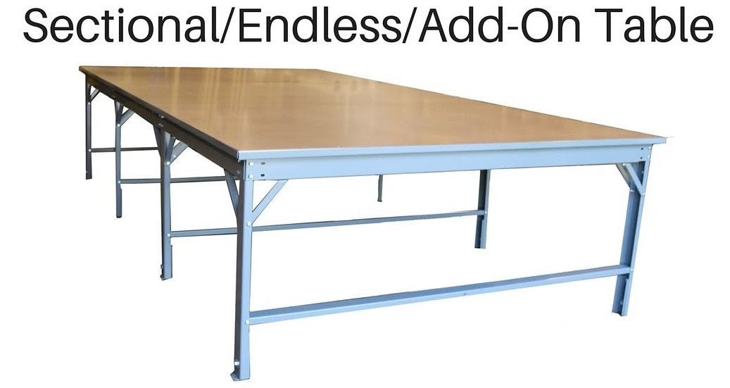 SPREADING AND CUTTING PRODUCTION TABLES